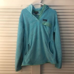 Green and blue Patagonia sweater.